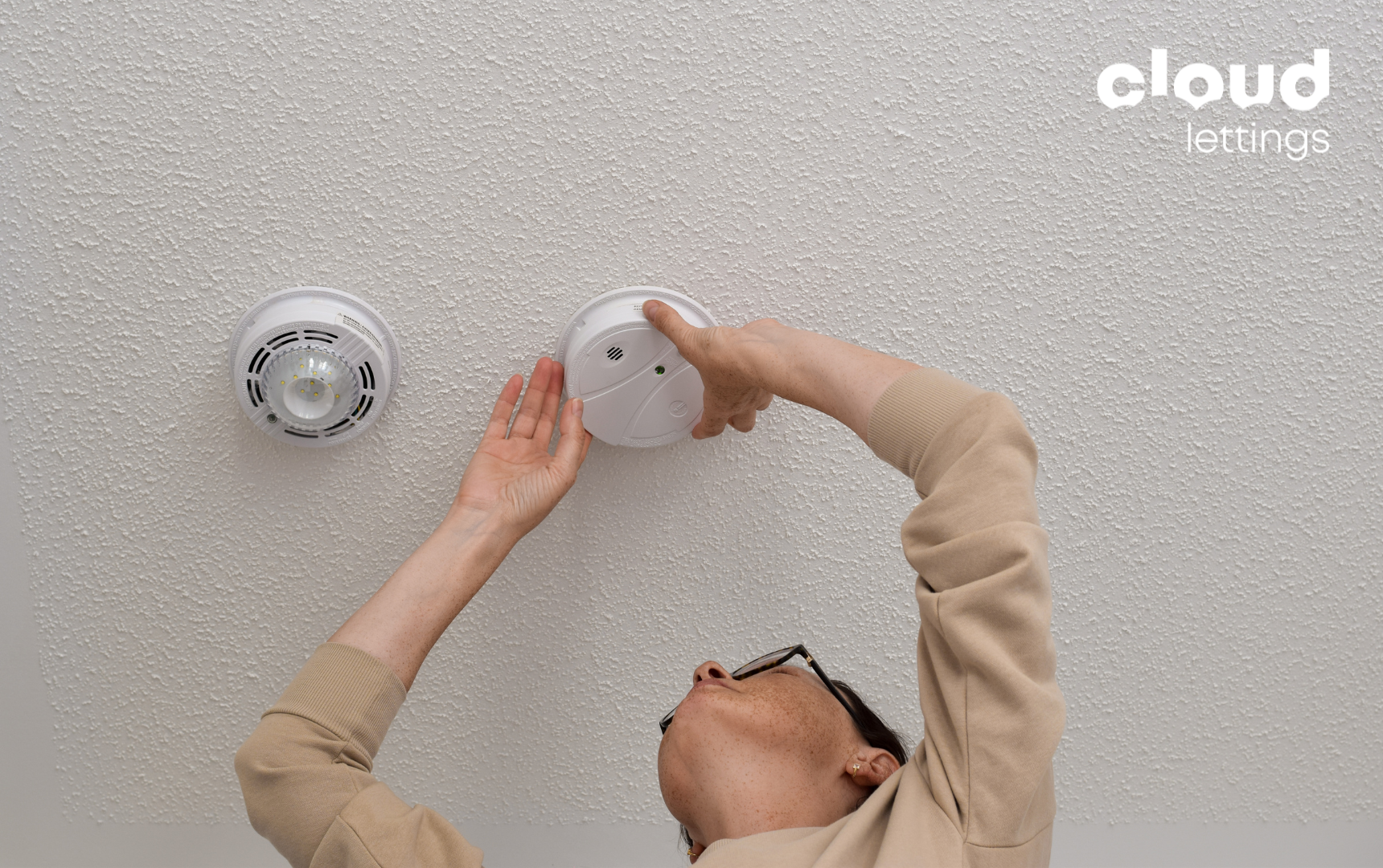 How to change a Grade D smoke alarm battery